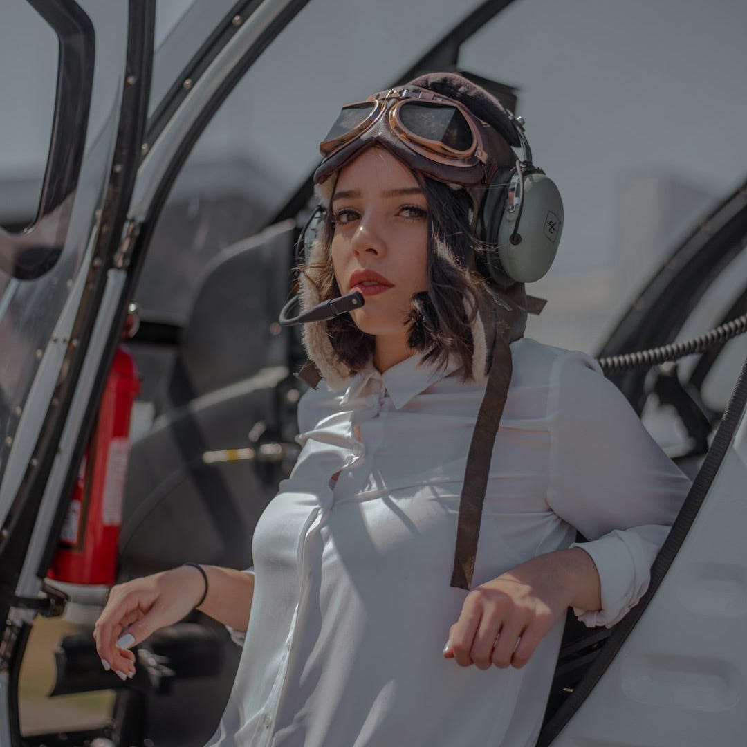 woman leaning on vehicle