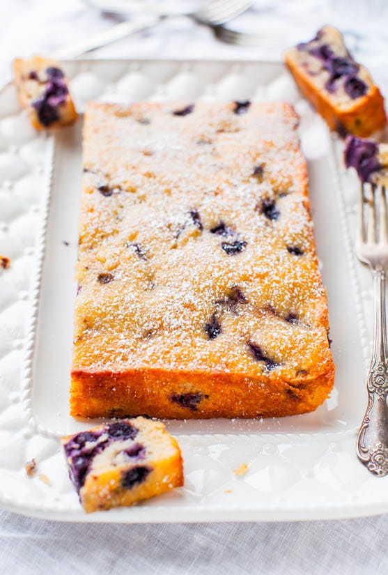 Blueberry Muffin and Buttermilk Pancakes Cake - Recipe at averiecooks.com Blueberry Muffin Cake — This fast and easy cake tastes like a big buttermilk pancake that ran into a blueberry muffin on the way to the oven. It’s fluffy, tender, and moist from both the buttermilk and sour cream that’s incorporated into the batter!