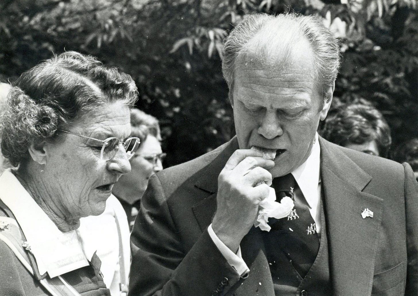 Gerald Ford eats a tamale - with the husk on