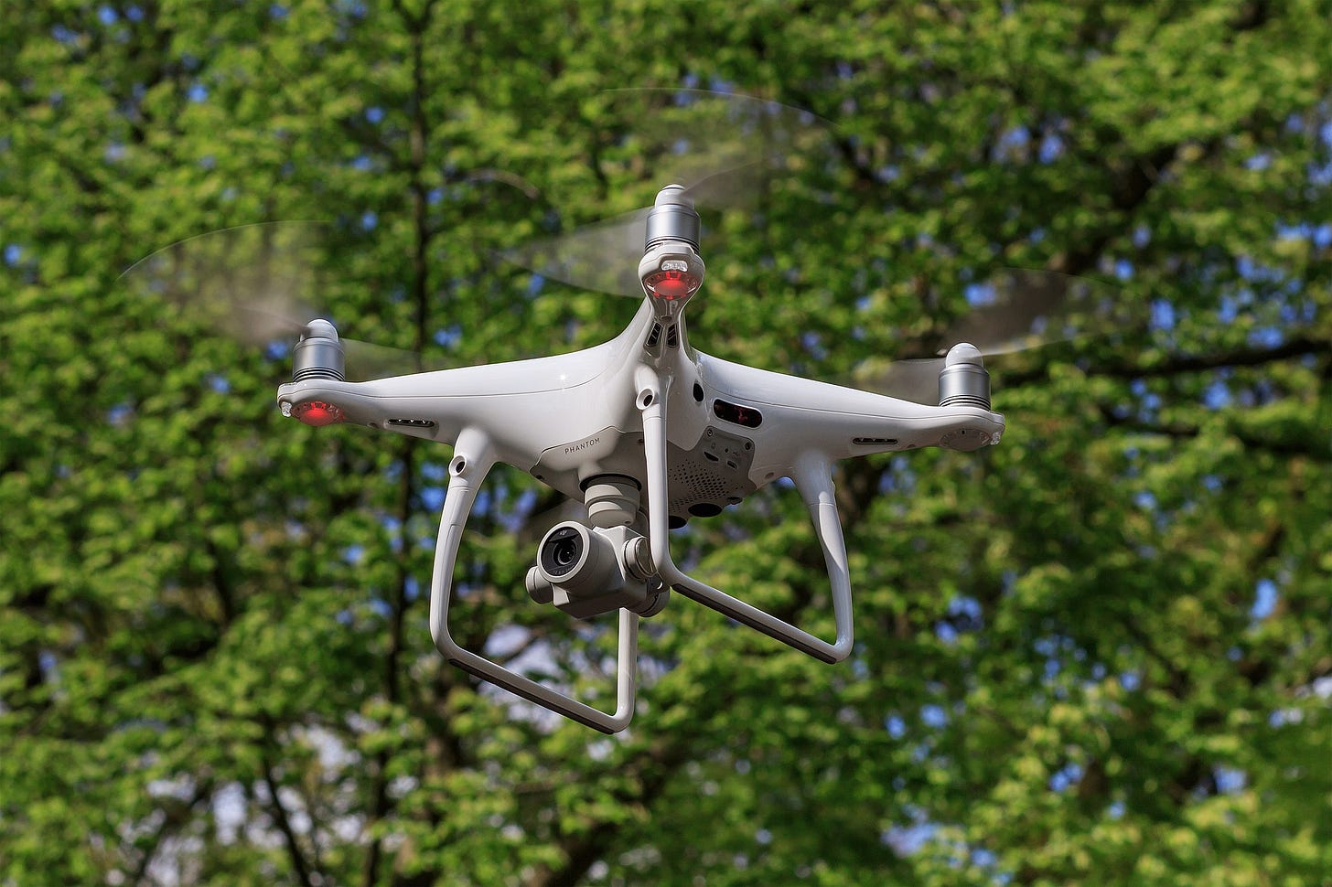 a Phantom 4 Pro Plus in the air a Phantom 4 Pro Plus in the air