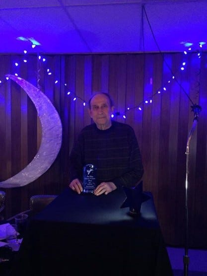 dad with award dad with award