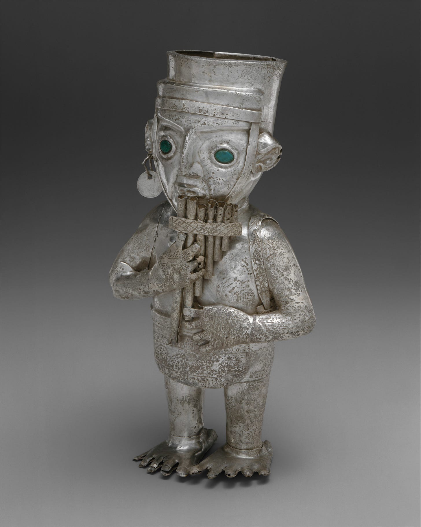 Panpiper-shaped vessel, Chimú artist(s), Silver, malachite, resin, Chimú Panpiper-shaped vessel, Chimú artist(s), Silver, malachite, resin, Chimú