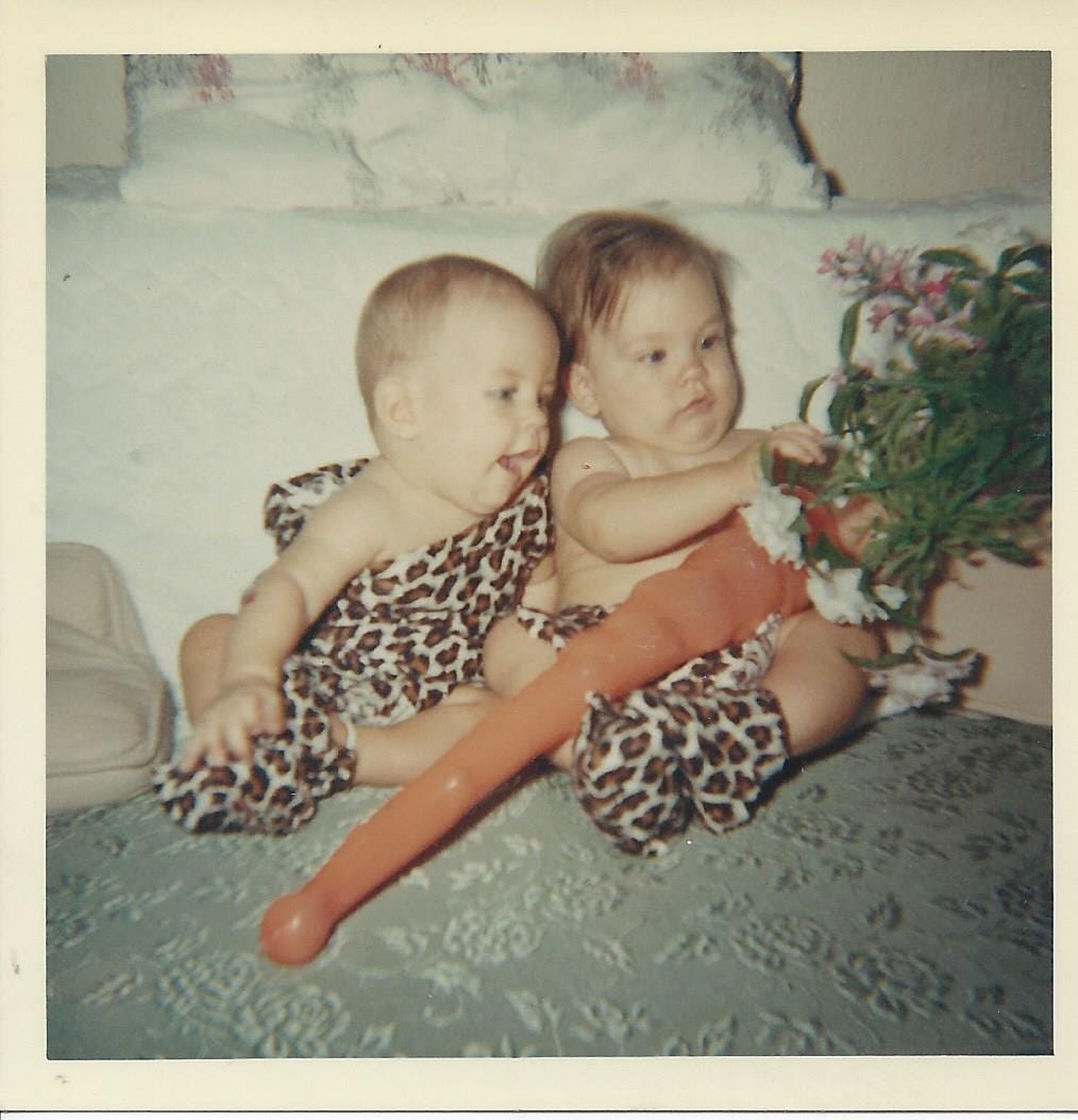 Two babies dressed as Pebbles Flintstone and Bamm-Bamm Rubble for Halloween Two babies dressed as Pebbles Flintstone and Bamm-Bamm Rubble for Halloween