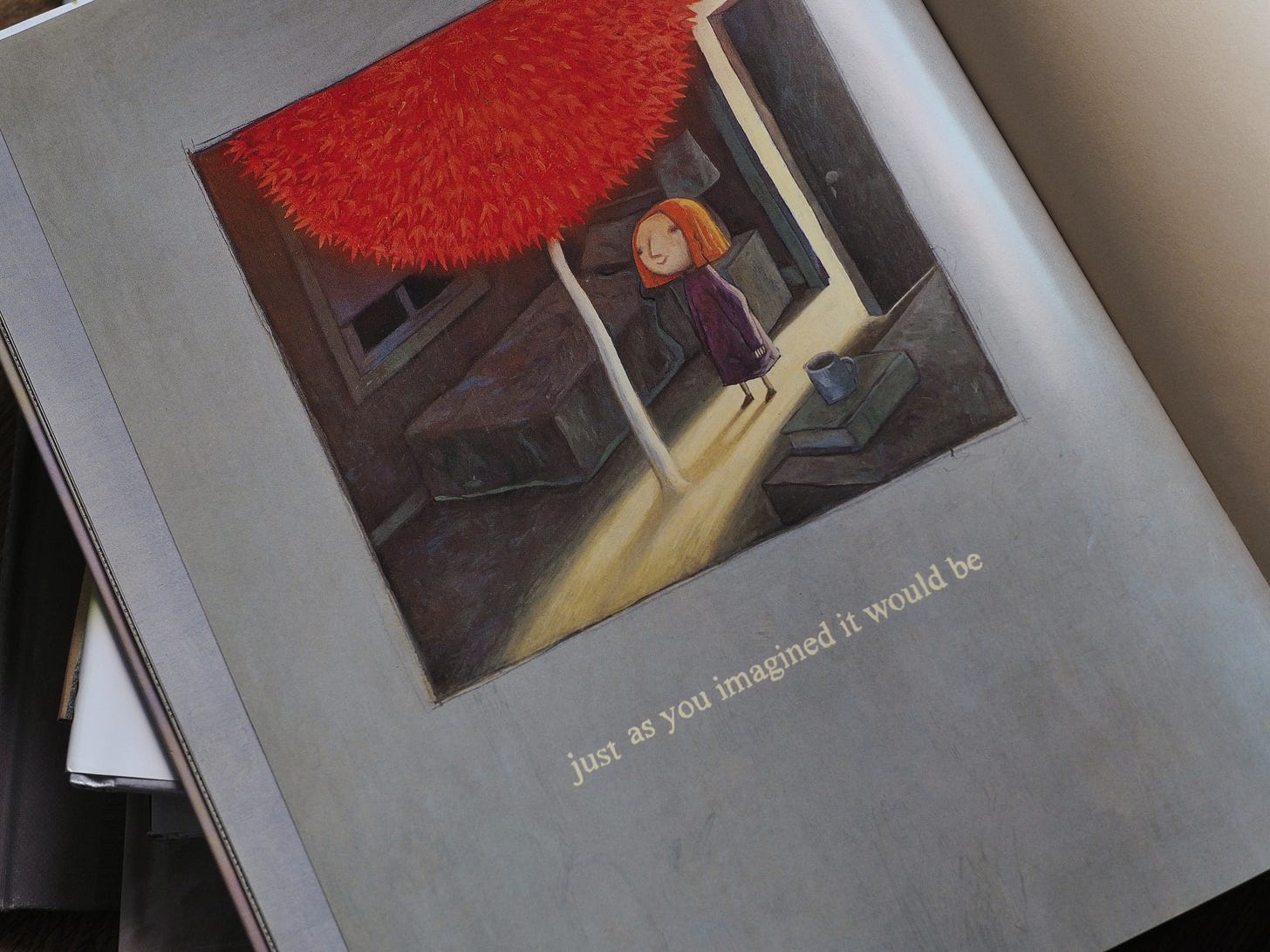 A photo of a page from Shaun Tan's 'The Red Tree'. It reads: "just as you imagined it would be."