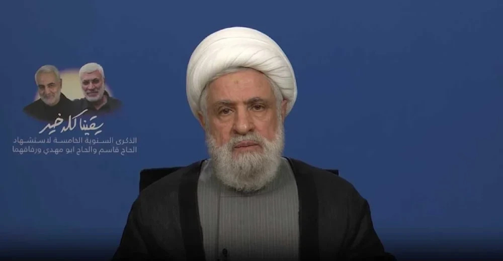 Hezbollah Secretary-General Sheikh Naim Qassem during a speech commemorating martyrs Hajj Qassem Soleimani and Abu Mahdi al-Muhandis on January 4, 2025 (Screengrab) Hezbollah Secretary-General Sheikh Naim Qassem during a speech commemorating martyrs Hajj Qassem Soleimani and Abu Mahdi al-Muhandis on January 4, 2025 (Screengrab)