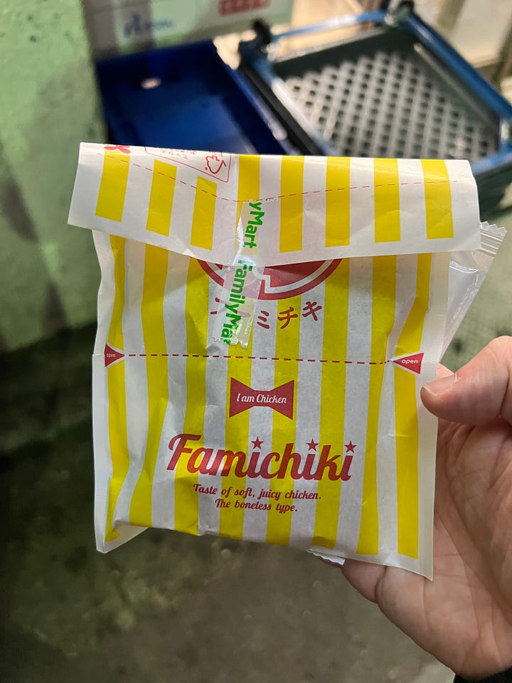 Left - white woman wearing black outfit Right - fried chicken cutlet in yellow paper bag