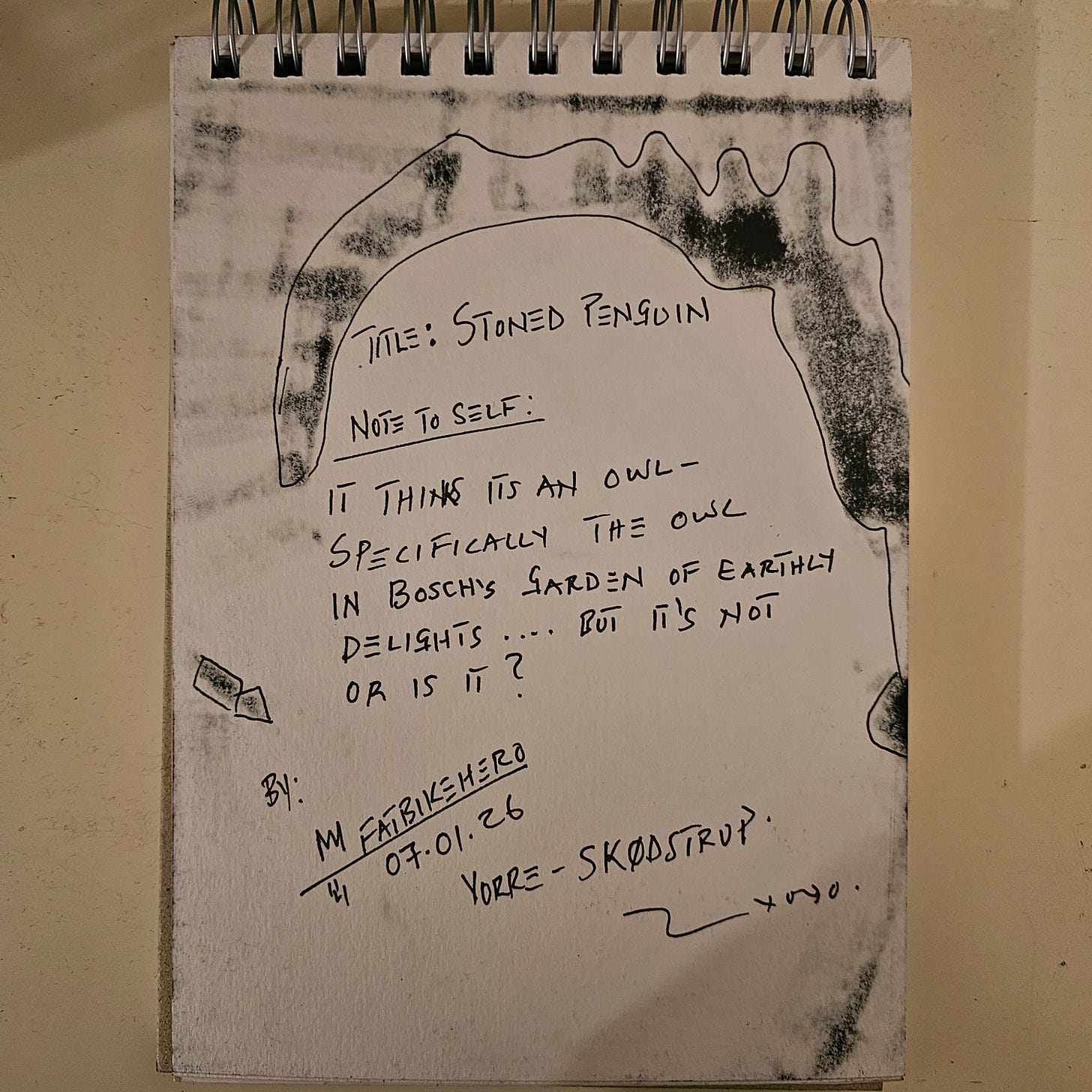 A photograph of a sketchbook page featuring handwritten text in black ink. The text reads "Title: Stoned Penguin," followed by a "Note to self" referencing the owl in Bosch's Garden of Earthly Delights. It is signed "By: FatbikeHero," dated "07.01.26," and located in "Vorre - Skødstrup."