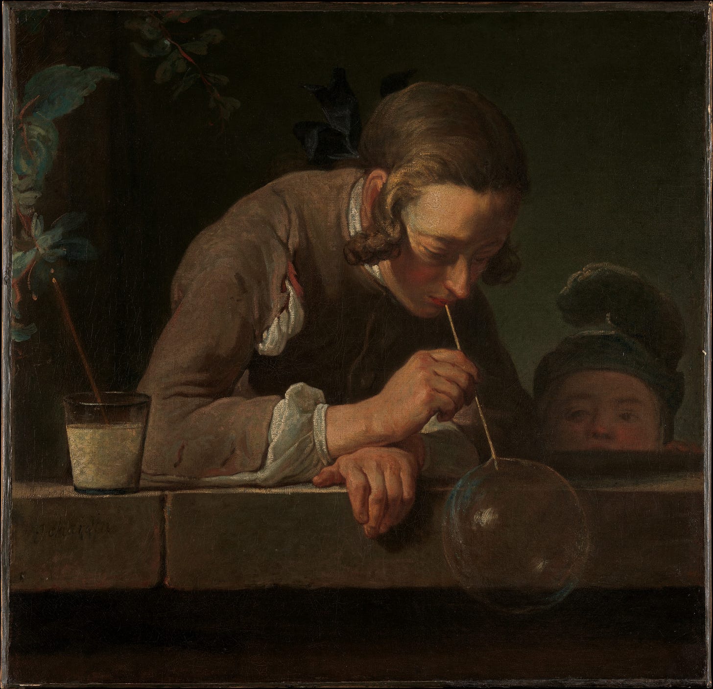 A boy leans out of a window blowing a large fragile soap bubble as a small child watches A boy leans out of a window blowing a large fragile soap bubble as a small child watches
