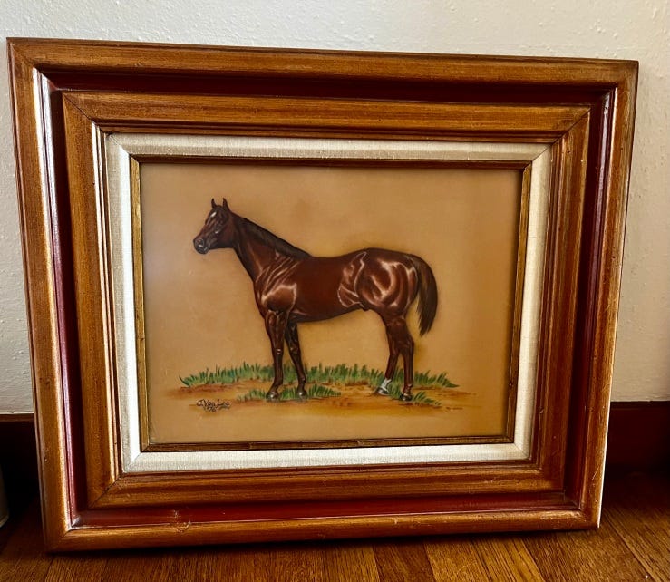 A framed pastel portrait of the sorrel Quarter Horse stallion, Four Slat. His coat gleams.