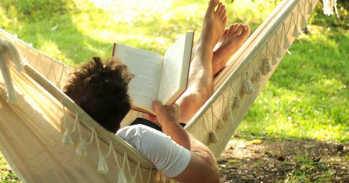 man resting on hammock