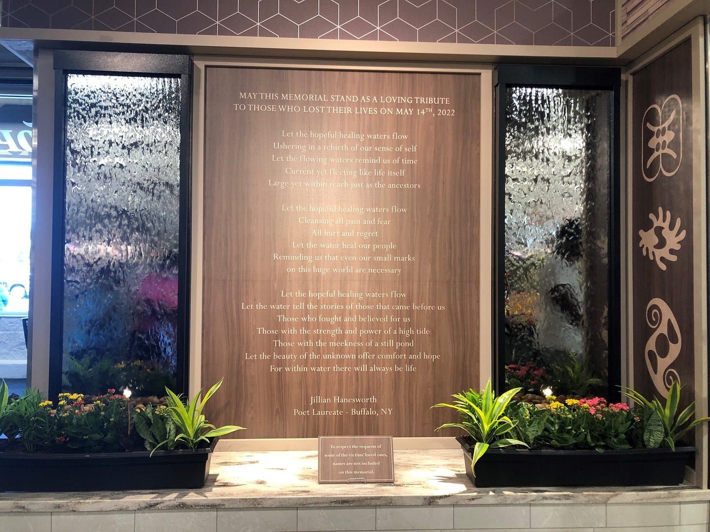 Tops grocery store in Buffalo reopens to mixed reactions after mass shooting - OPB Tops grocery store in Buffalo reopens to mixed reactions after mass shooting - OPB