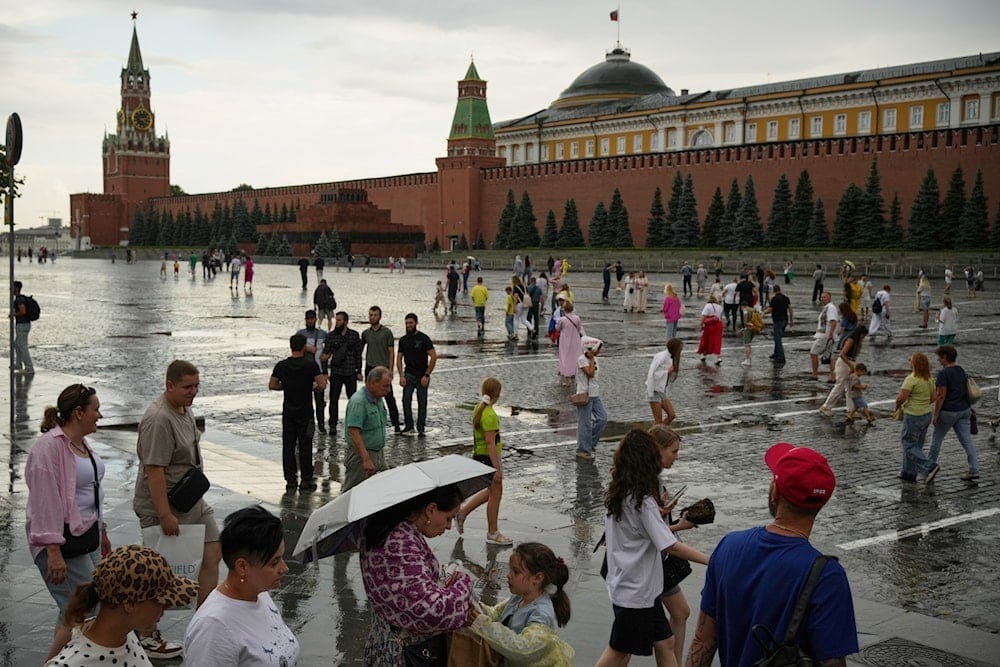 People walk through Red Square after a rainfall in Moscow, Tuesday, July 28, 2026 (AP) People walk through Red Square after a rainfall in Moscow, Tuesday, July 28, 2026 (AP)