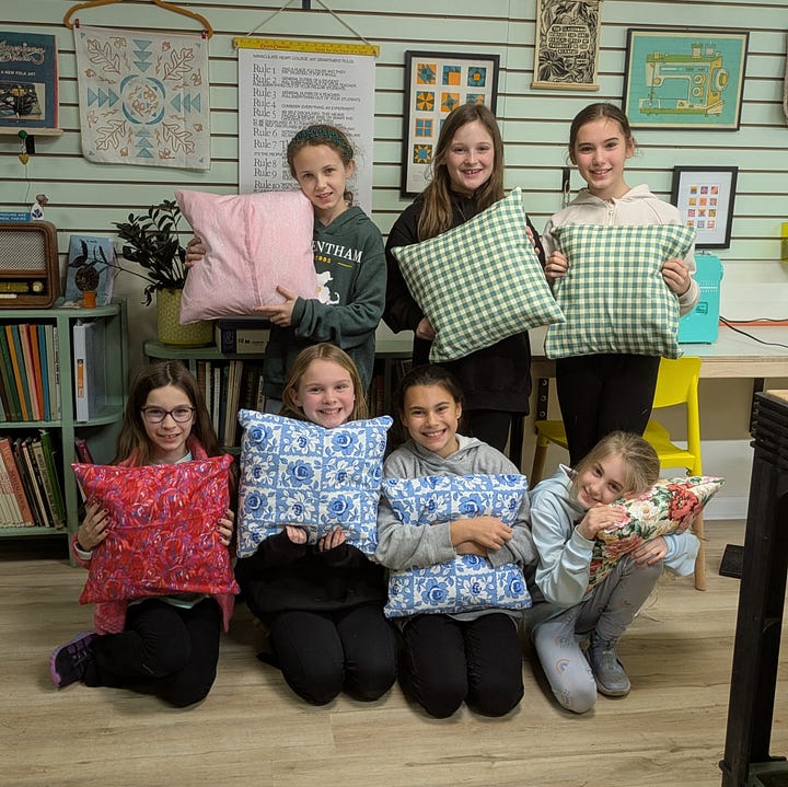 L: girl scout group makes pillows R: Rachel sews a baseball cap