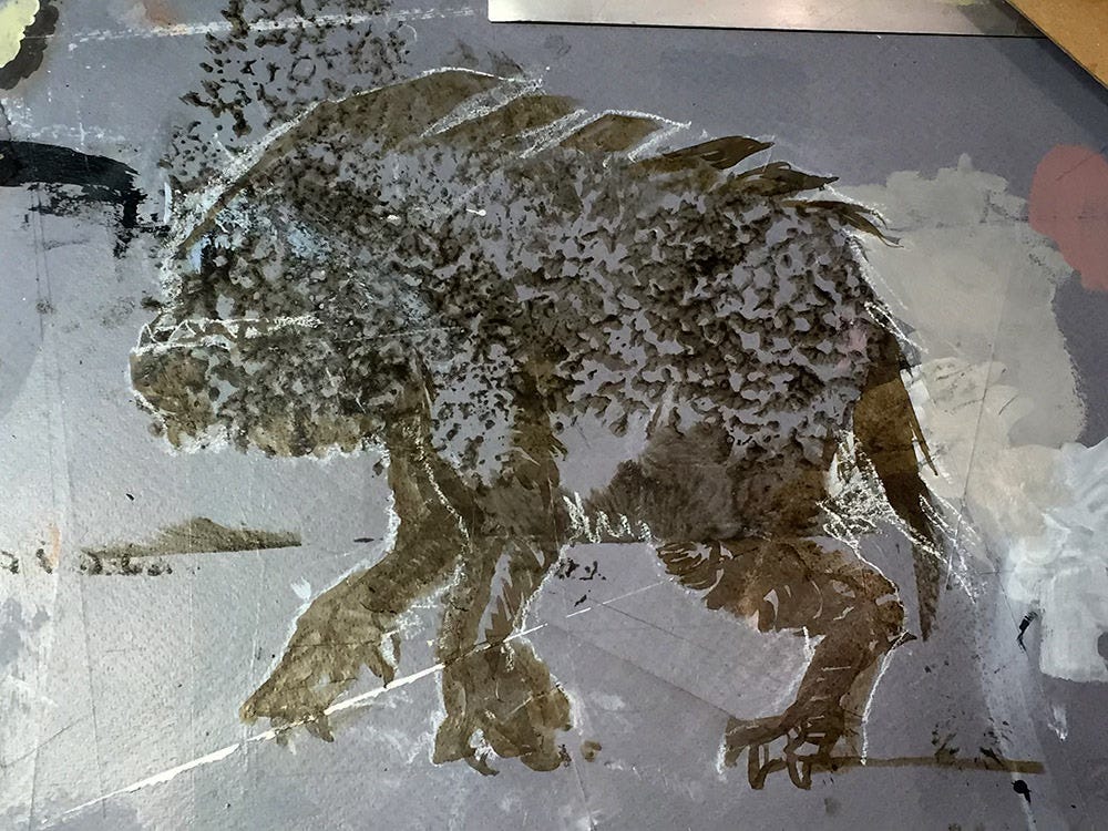 Early photo of the paint marks left by the sponge, spotty and showing through to the gray underneath. An outline has been drawn chalked in and limbs and a tail added. Early photo of the paint marks left by the sponge, spotty and showing through to the gray underneath. An outline has been drawn chalked in and limbs and a tail added.