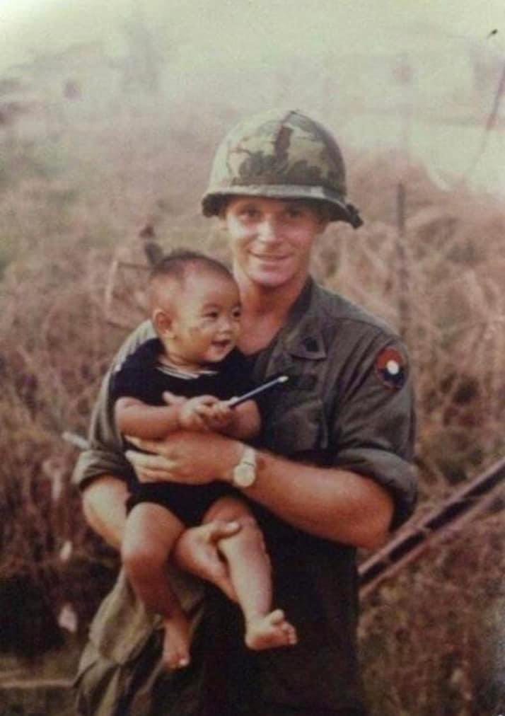 Photos of American GI in Vietnam with baby, President Richard Nixon. Woodstock mud pit.