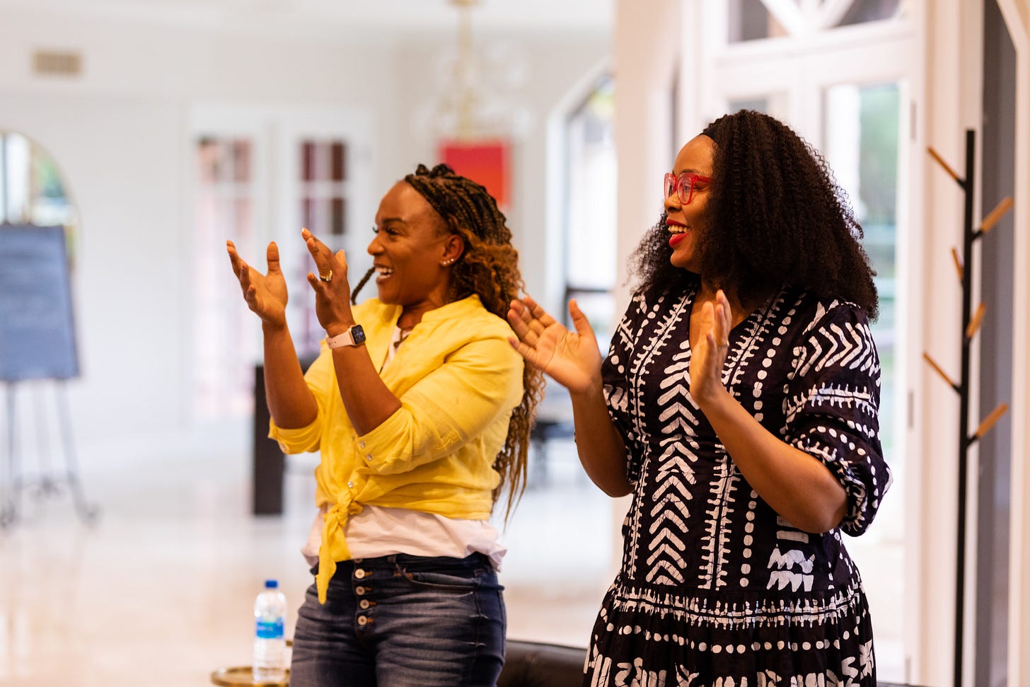 Women celebrating and applauding 