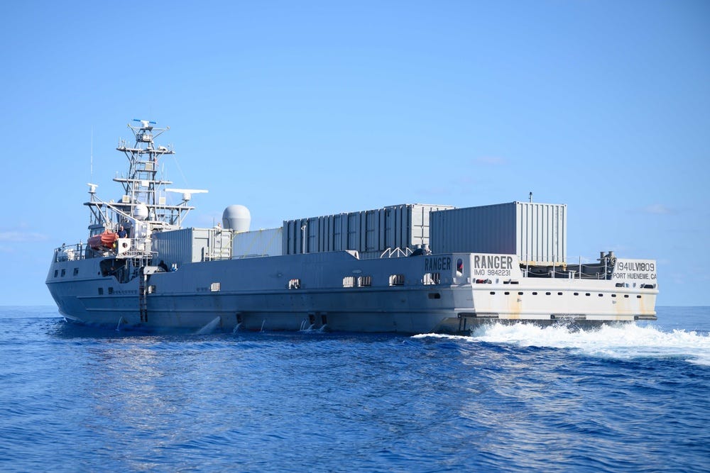 The gray unmanned surface vessel Ranger underway in the Pacific Ocean. The gray unmanned surface vessel Ranger underway in the Pacific Ocean.