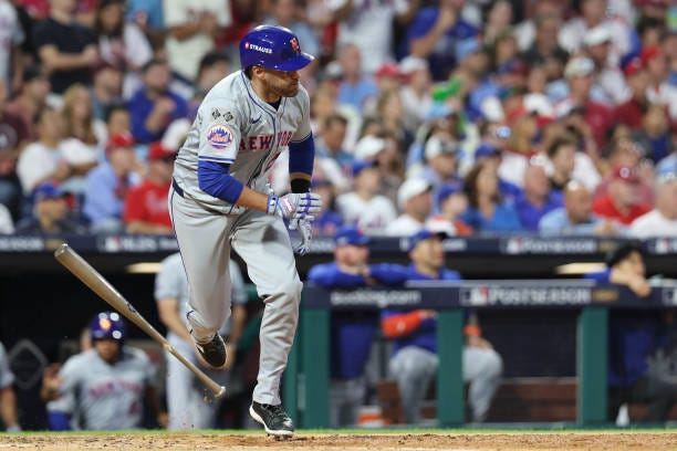 Martinez of the New York Mets hits a one RBI single in the eighth inning during Game 1 of the Division Series presented by Booking.com between the...