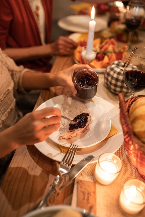 Free A Person Putting a Jam on a Bread Stock Photo
