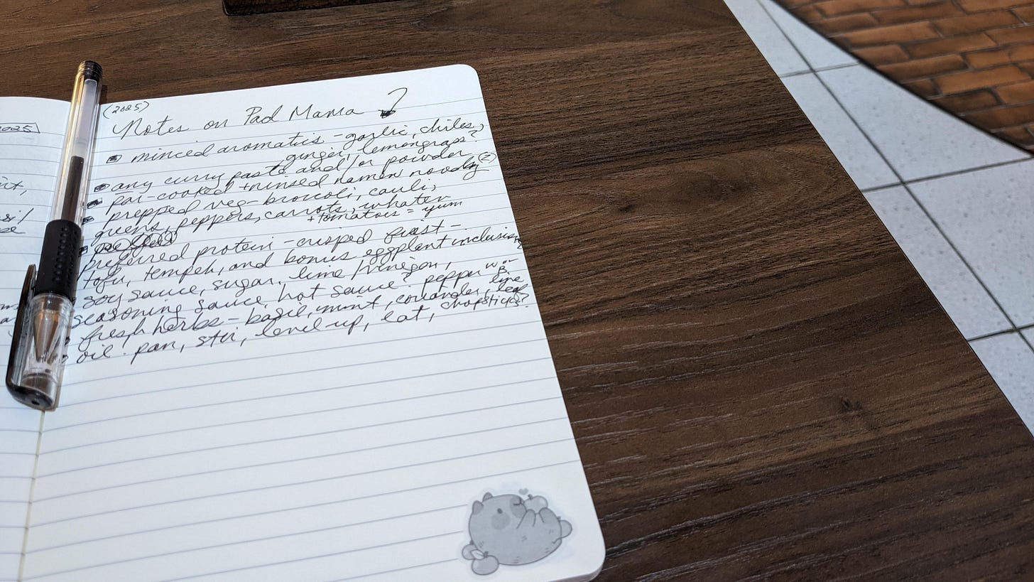 writing in a notebook