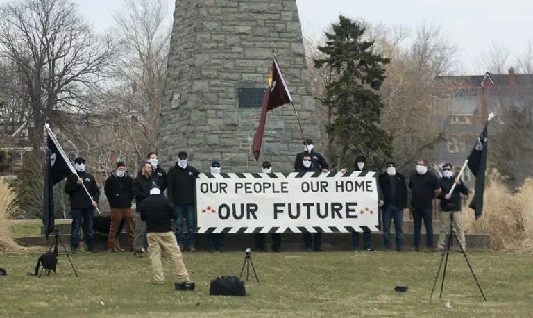 May be an image of 9 people, monument and text that says 'OUR PEOPLE OUR ረን! HOME .OUR FUTURE.'