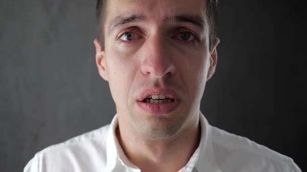 Portrait of sad man crying with tears in eyes. Depressed businessman crying.  Man in despair. — Stock Video © Magicmore #219363604