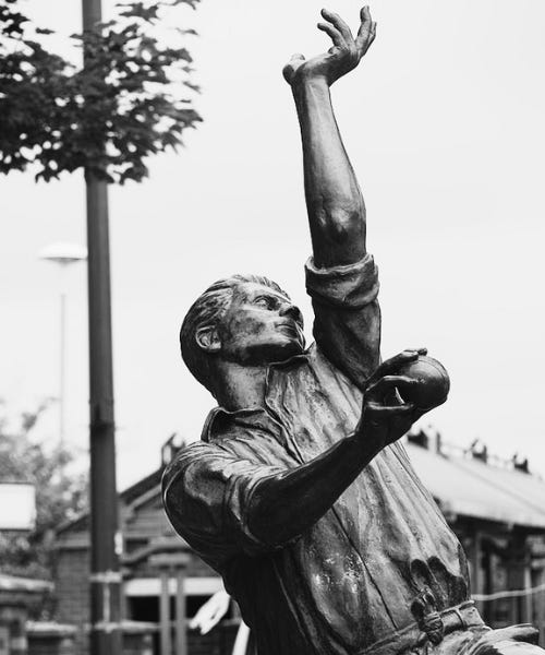 A black and white picture of the Harold Larwood statue in Kirkby in Ashfield A black and white picture of the Harold Larwood statue in Kirkby in Ashfield