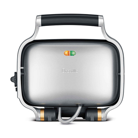 From left Breville panini press; Dumplings for Lili by Melissa Iwai; Guidecraft Toddler Tower
