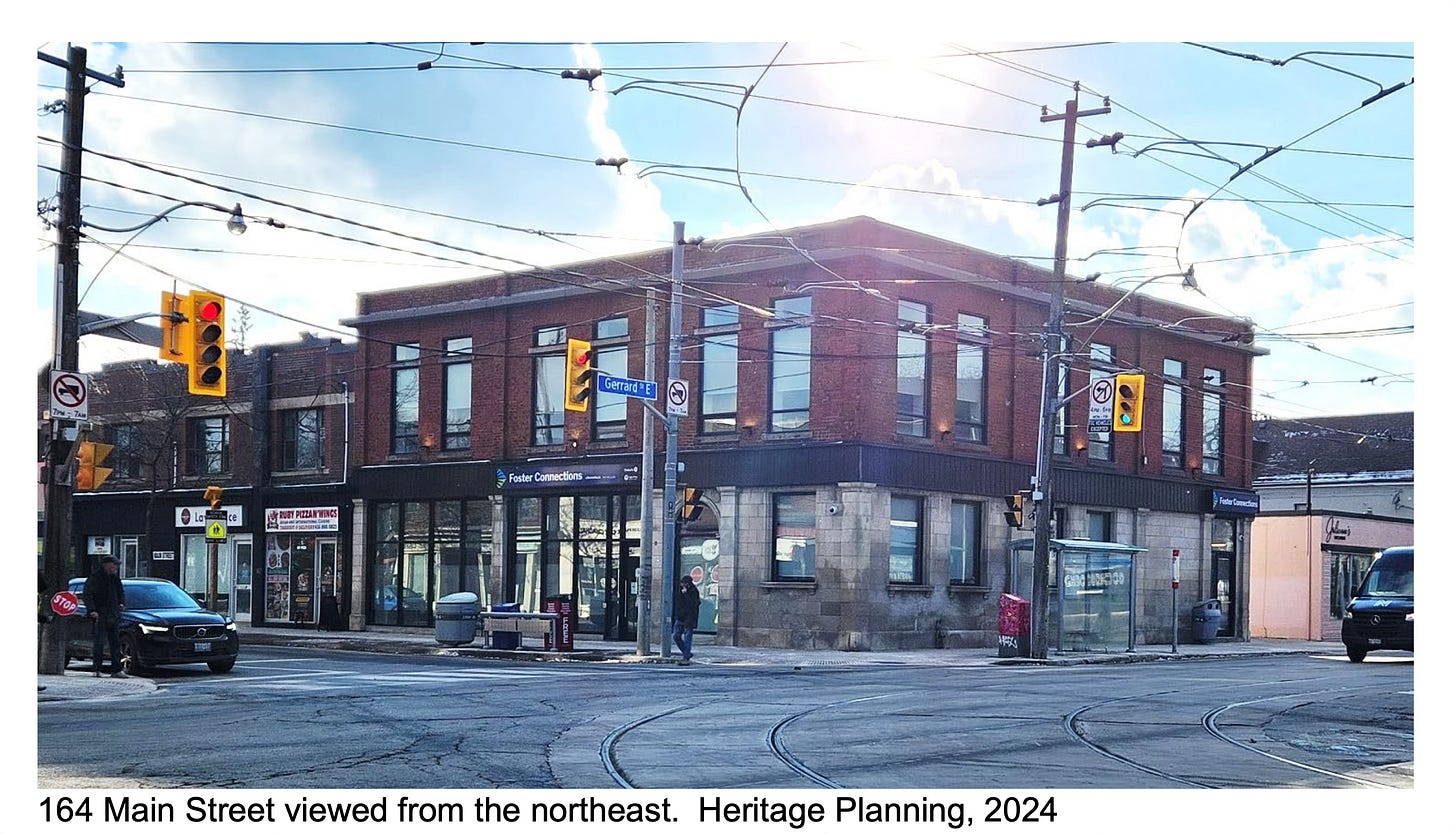 A photo of the building at 164 Main Street. It's a two-storey brick building
