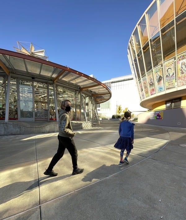 Owen and Emma outside the carousel at the Children's Creativity Museum in San Francisco.