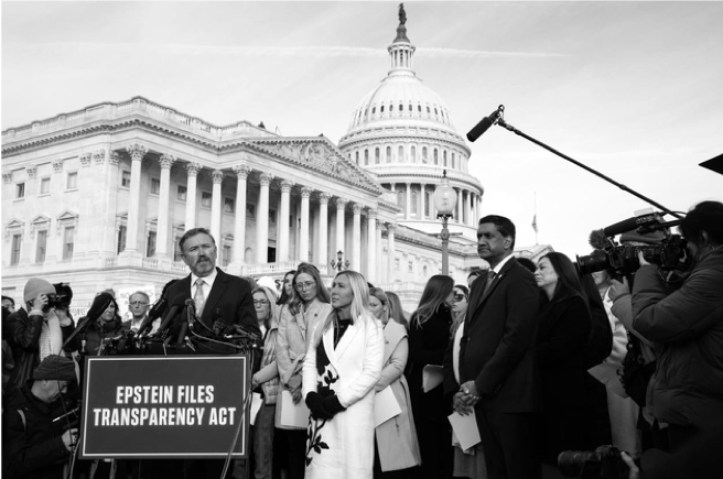 Reps. Thomas Massie (R-Ky.), Marjorie Taylor Greene (R-Ga.), and Ro Khanna (D-Calif.) stand alongside Epstein victims during a news conference Tuesday