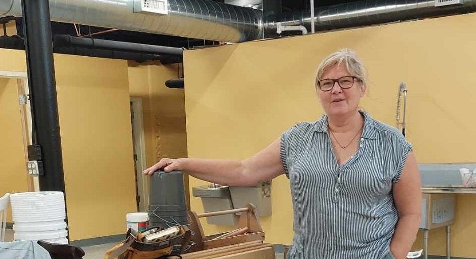 Kim Hansen in her pottery studio with all the stuff ready to be put together