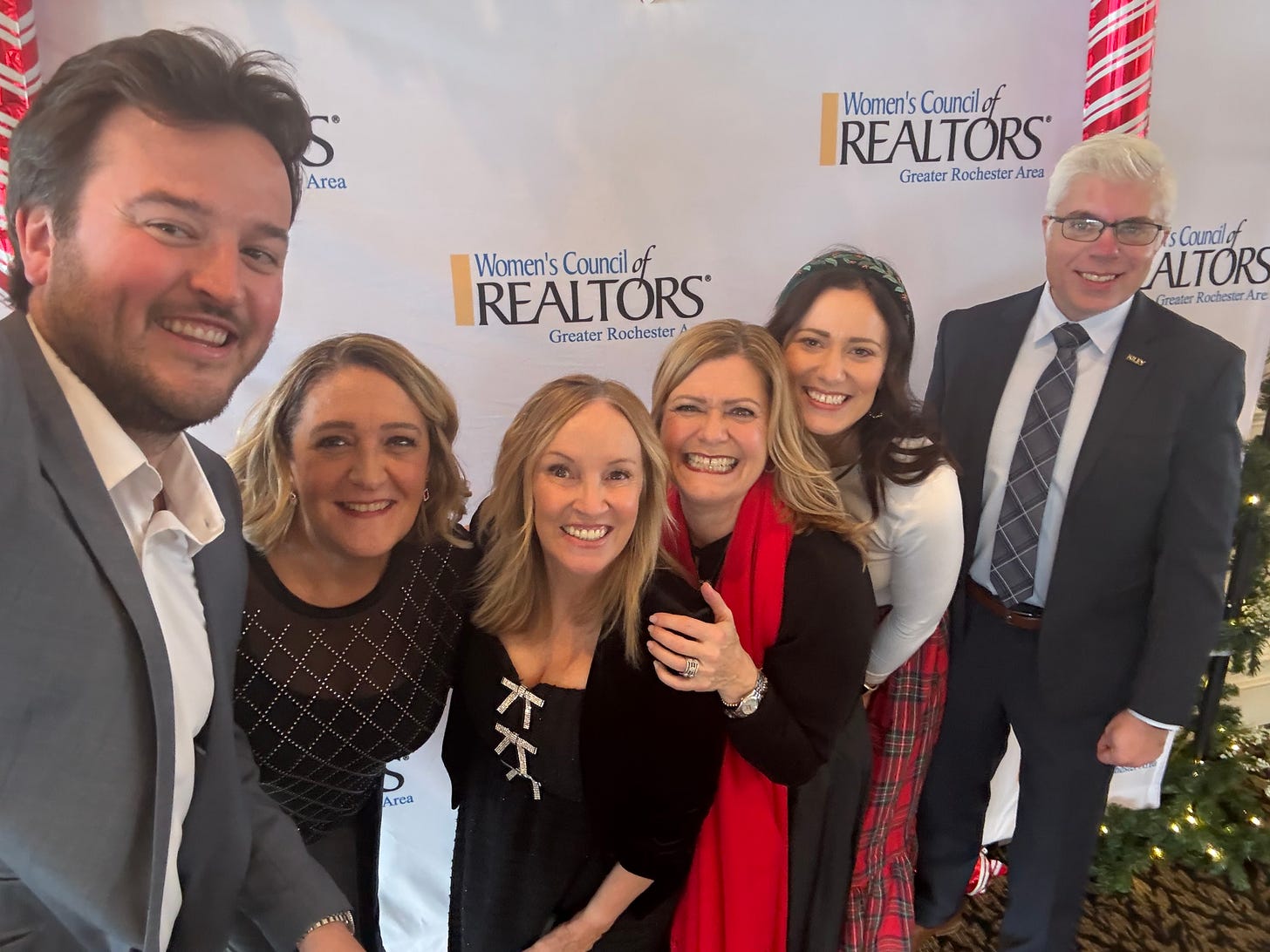 Ken Kiley (KILEY) posing with other attendees at the Greater Rochester Area Women’s Council of REALTORS® Ken Kiley (KILEY) posing with other attendees at the Greater Rochester Area Women’s Council of REALTORS®