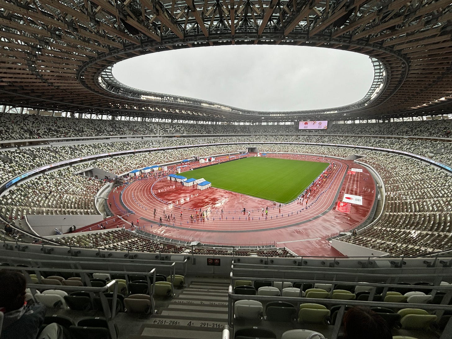 Runners entering the stadium for the finish of the Tokyo Legacy Half Marathon