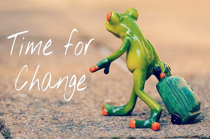 Frog with suitcase on image with caption “Time for Change” Frog with suitcase on image with caption “Time for Change”