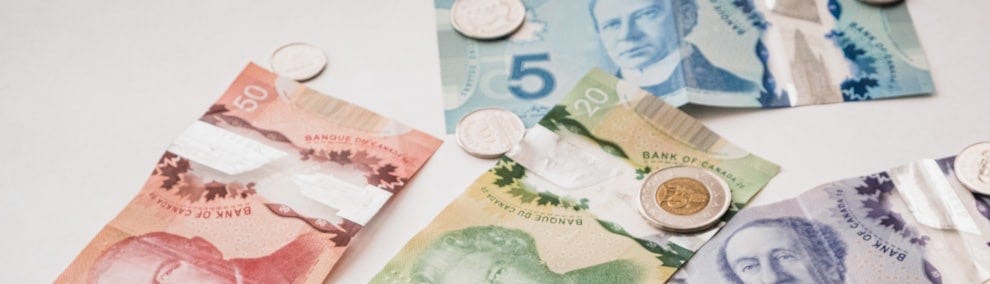 a bunch of money sitting on top of a table a bunch of money sitting on top of a table