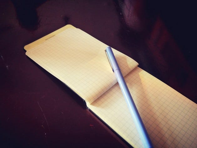 Notepad and pen Notepad and pen