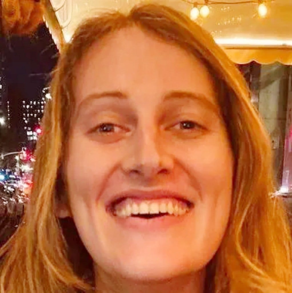 Headshot of Julie Swoope smiling. Headshot of Julie Swoope smiling.