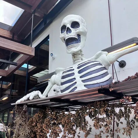 Skeletons in trees, scary decorations in Lake Oswego