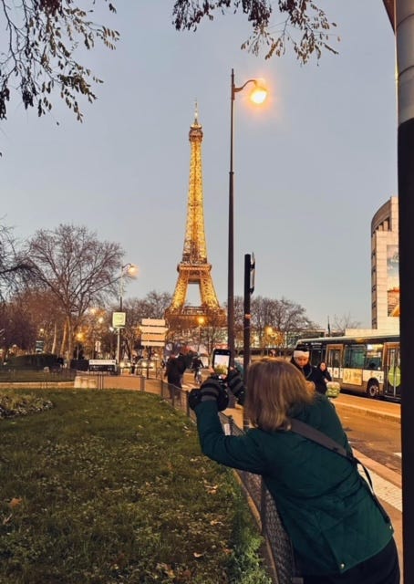 Jessica taking a picture of the Eiffel Tower Jessica taking a picture of the Eiffel Tower