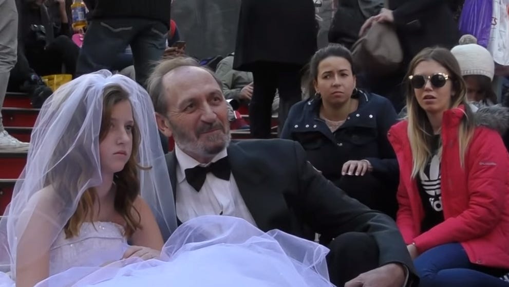 Passers-by are stunned by a social experiment stunt held in New York to highlight child marriage Passers-by are stunned by a social experiment stunt held in New York to highlight child marriage