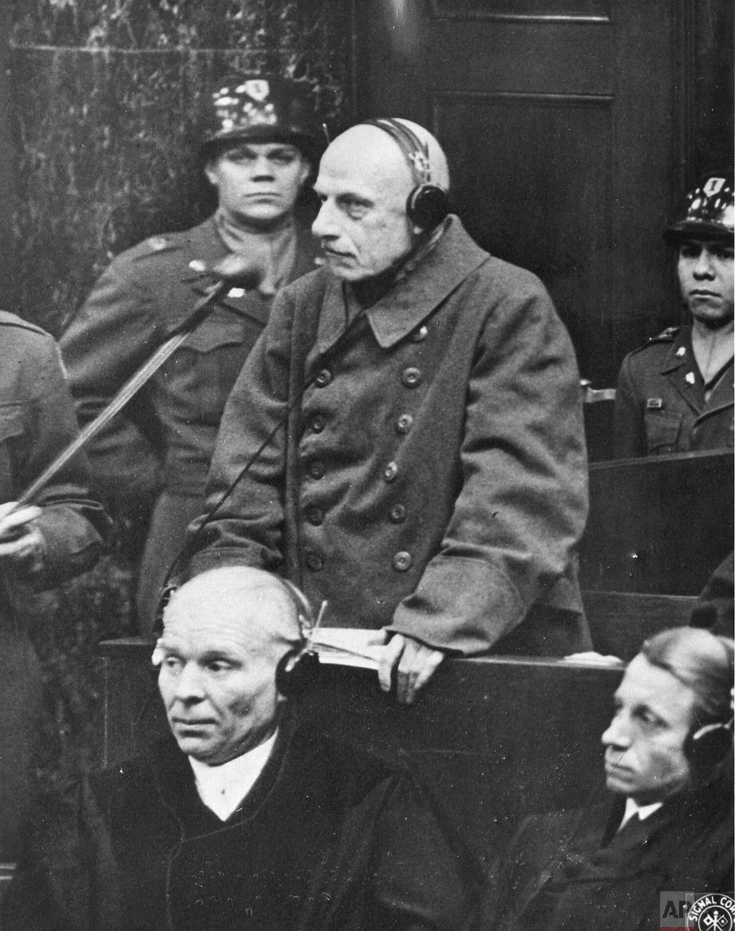 German Field Marshal Wilhelm Leeb pleads not guilty at the opening of Case 12, facing charges alongside other high-ranking officers at the Nuremberg Trials on December 30, 1947.