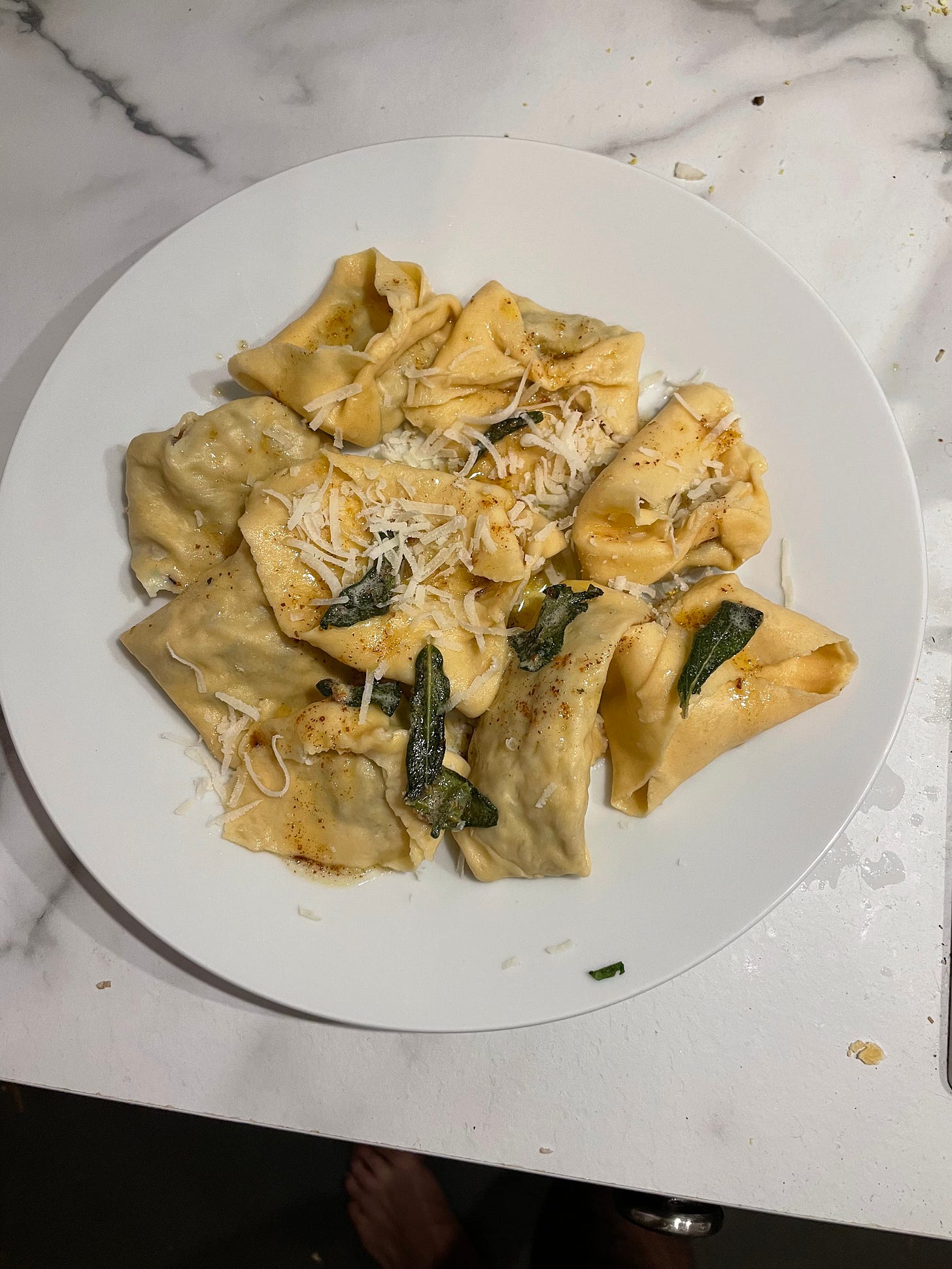 Photo of winter tortellini, served with sage brown butter. 