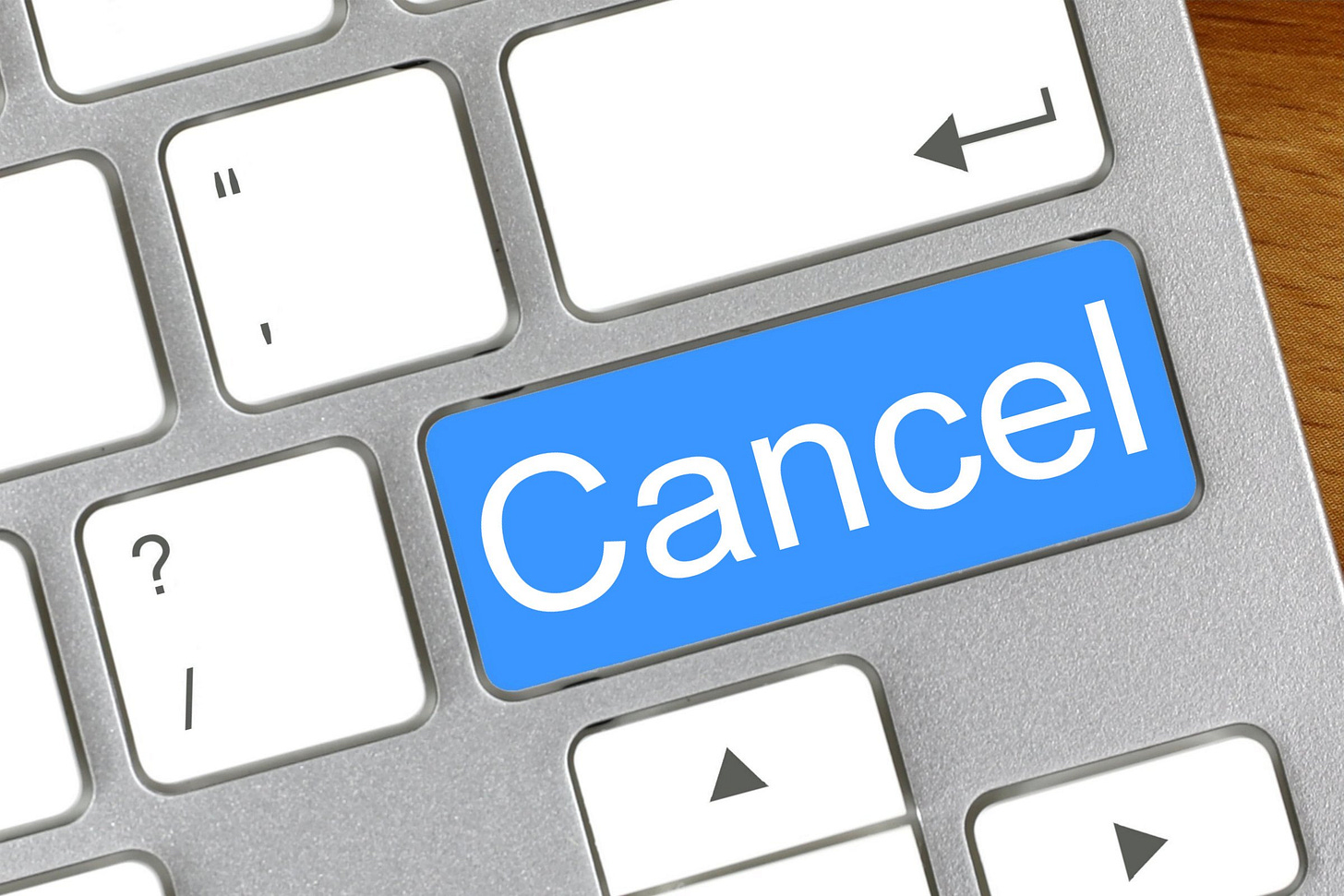 CGI picture of a keyboard with 'Cancel' on a blue key (replacing 'Shift' key) CGI picture of a keyboard with 'Cancel' on a blue key (replacing 'Shift' key)