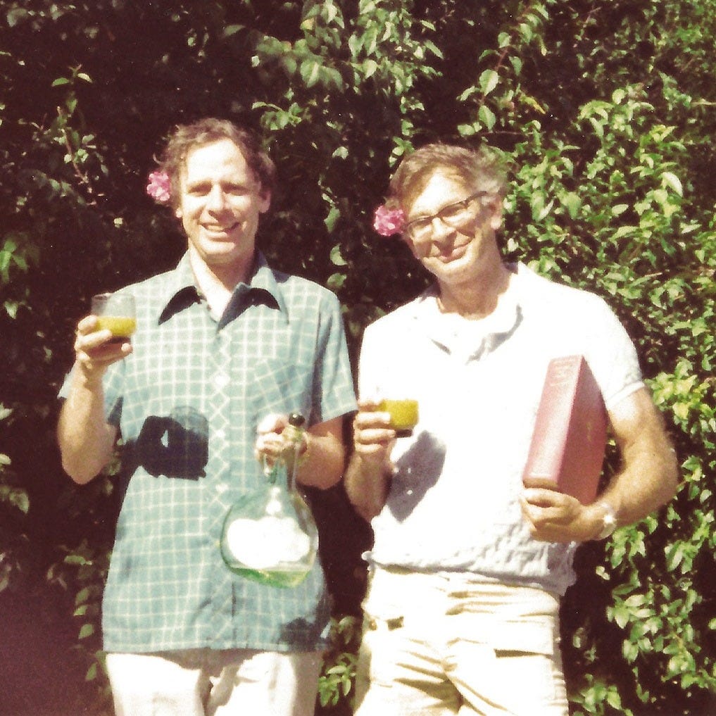 This image may contain Amos Tversky Human Person Drink Beverage Alcohol Food Meal Face Plant Tree and Drinking This image may contain Amos Tversky Human Person Drink Beverage Alcohol Food Meal Face Plant Tree and Drinking