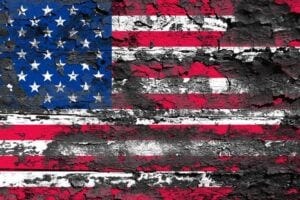 American flag with peeling paint