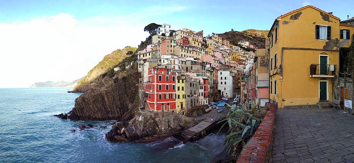 Two views of the colorful houses of Riomaggiore.