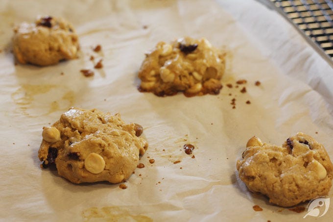 Step 9 - Bake for 10-12 minutes. The cookies should spread slightly and lose their doughy shine; the top and edges should just begin to turn lightly brown. Allow cookies to rest on the pan for 2-3 minutes Step 9 - Bake for 10-12 minutes. The cookies should spread slightly and lose their doughy shine; the top and edges should just begin to turn lightly brown. Allow cookies to rest on the pan for 2-3 minutes