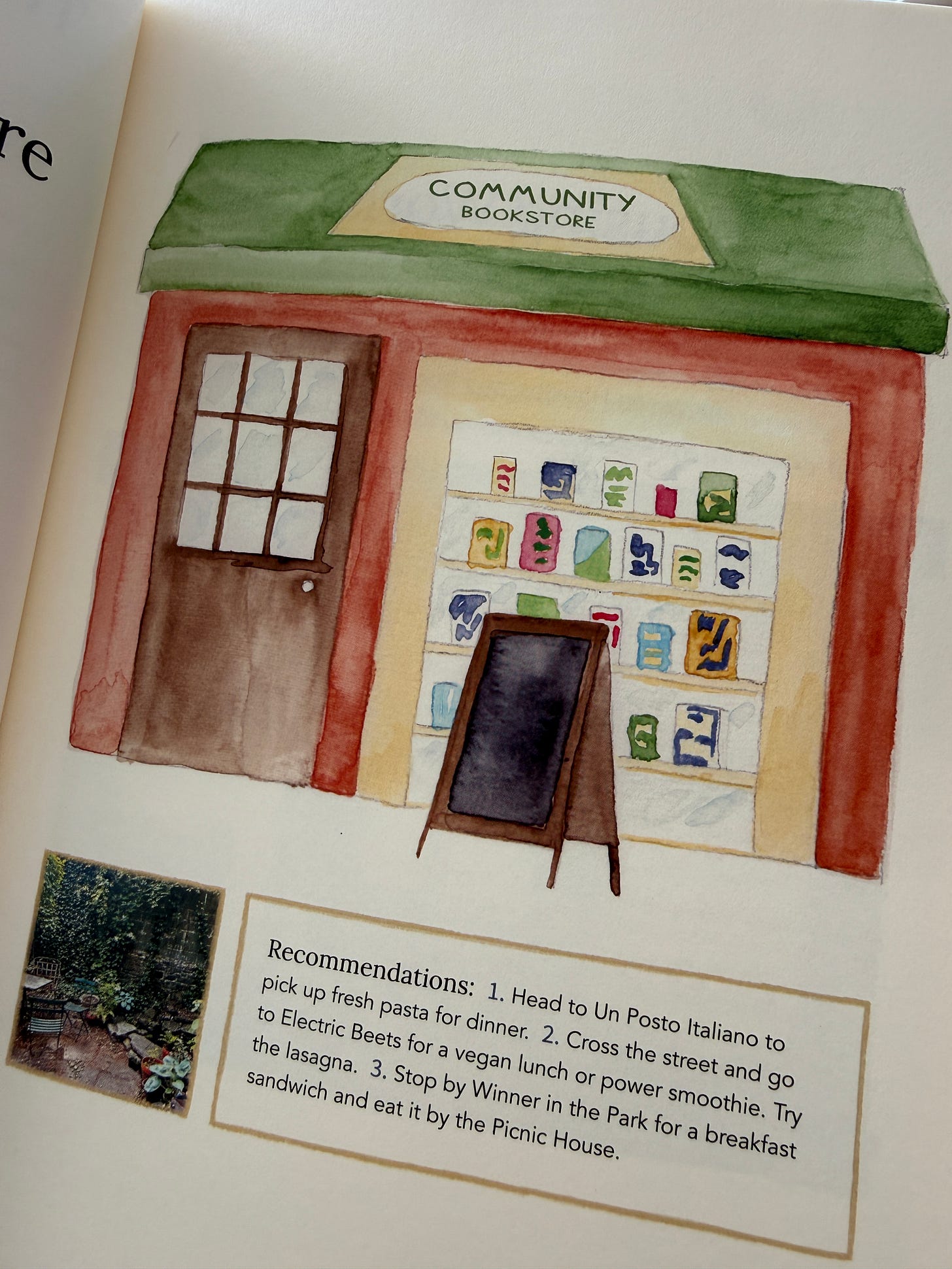 A photograph of a book page featuring a painting of a community book store and a list of recommendations for things to do nearby. A photograph of a book page featuring a painting of a community book store and a list of recommendations for things to do nearby.