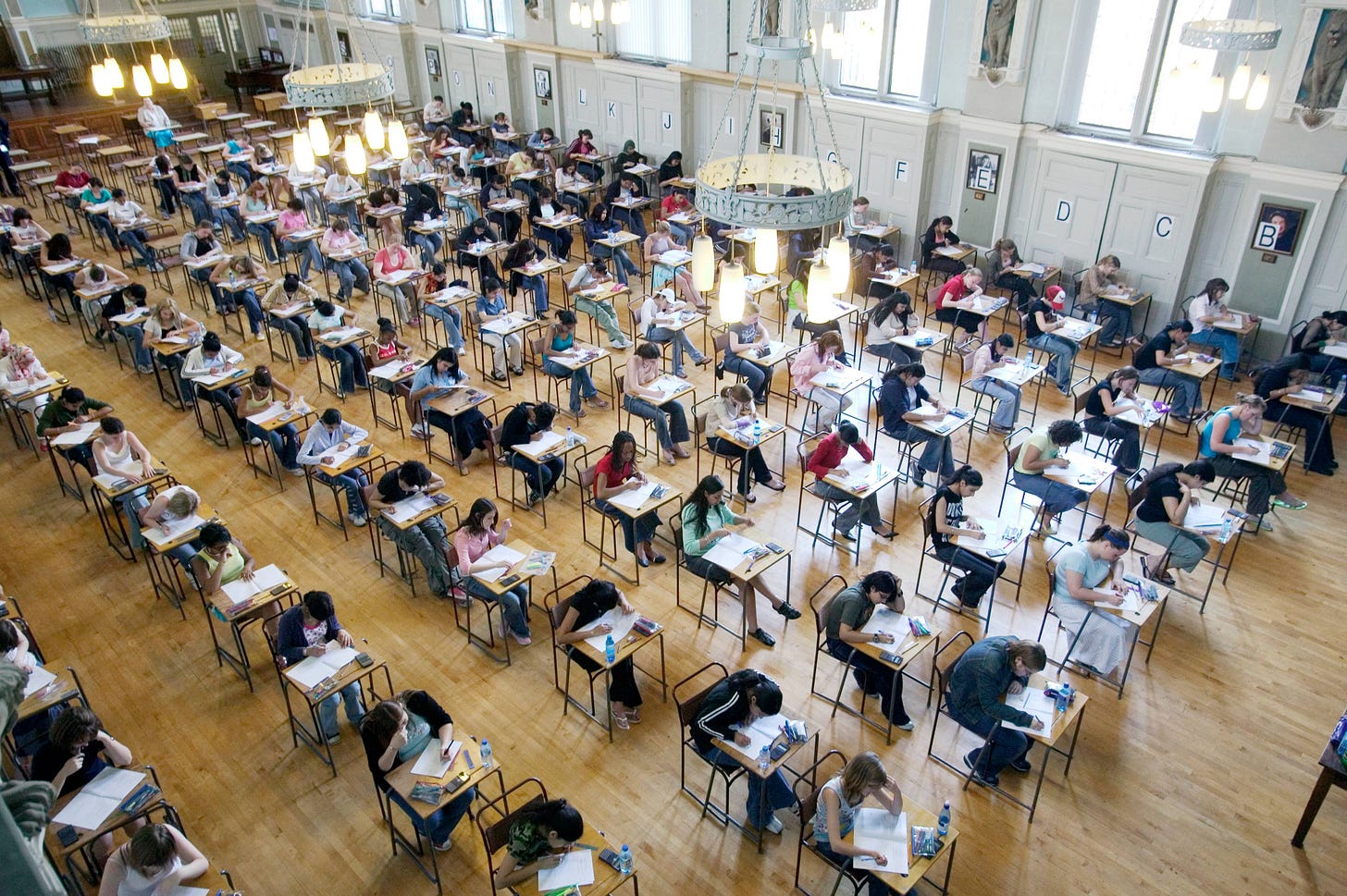A bird's eye view of students taking exams A bird's eye view of students taking exams